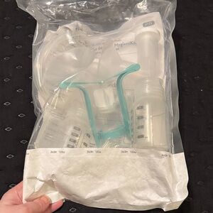 Unopened New Breast Pump Kit with Bottles